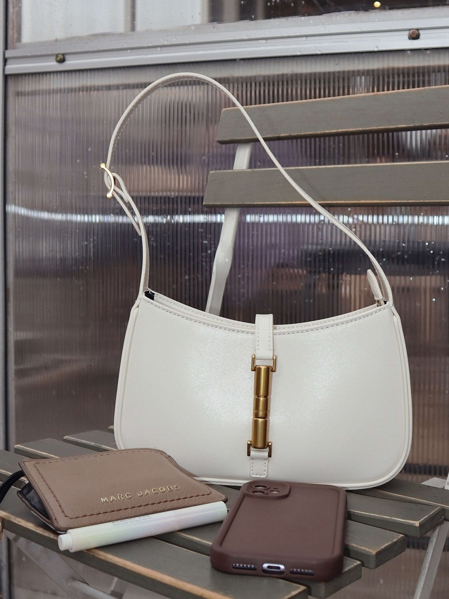 Rose clutch with strap